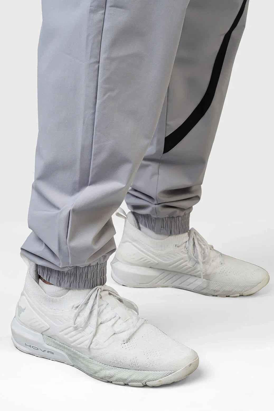 Light grey Momentum Joggers by Fuaark Nz, showing the comfortable fit and soft fabric of these stylish joggers.