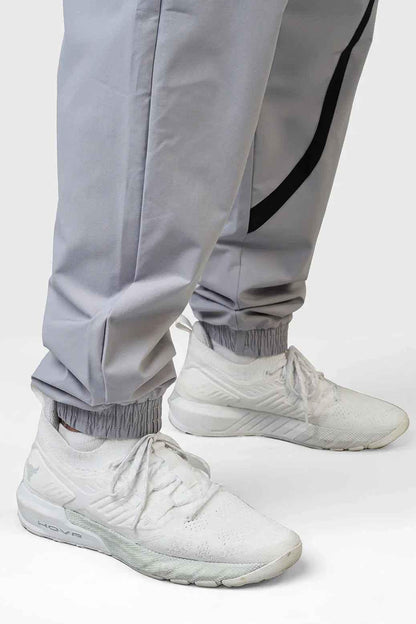 Light grey Momentum Joggers by Fuaark Nz, showing the comfortable fit and soft fabric of these stylish joggers.
