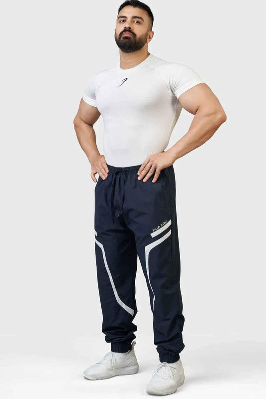 Fuaark Nz Momentum Navy Joggers laid flat showing comfortable fit and elastic waistband, casual athletic style for men.