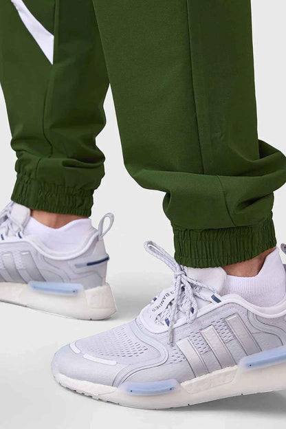 Fuaark Nz Momentum Joggers in olive color, showcasing the comfortable fit and casual style of these men's joggers.
