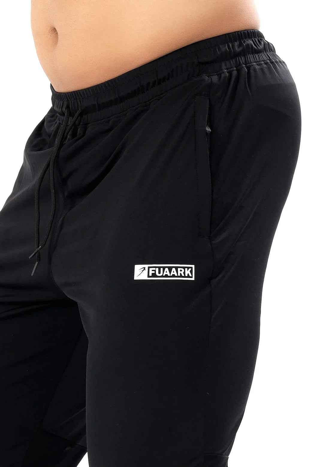 Black nylon joggers by Fuaark Nz featuring a sleek design, comfortable fit, and stylish look for casual wear.