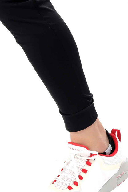 Black nylon joggers by Fuaark Nz featuring a sleek design for comfortable, stylish activewear.