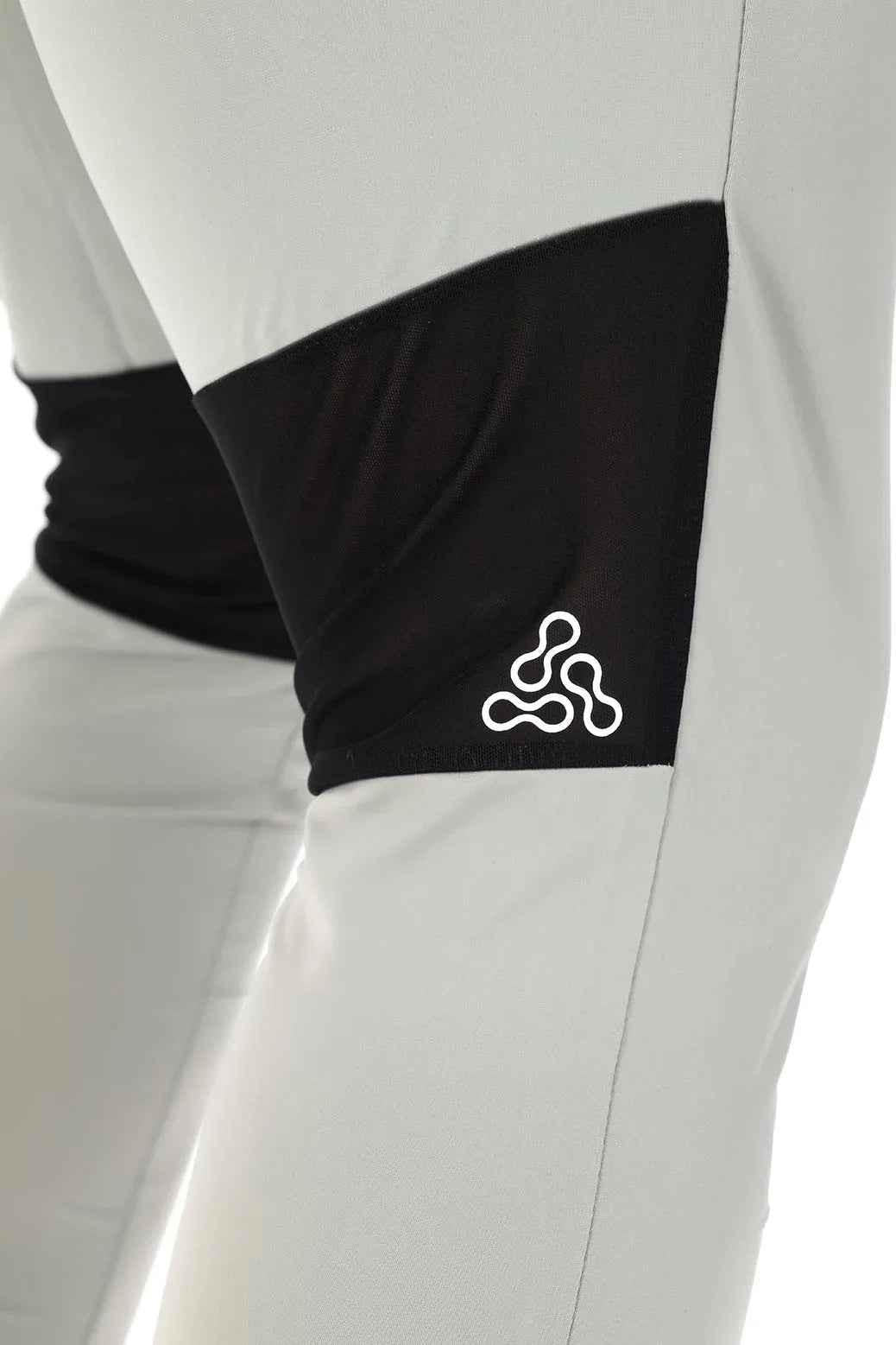 Light grey nylon joggers by Fuaark Nz featuring a comfortable fit and stylish design for casual wear.