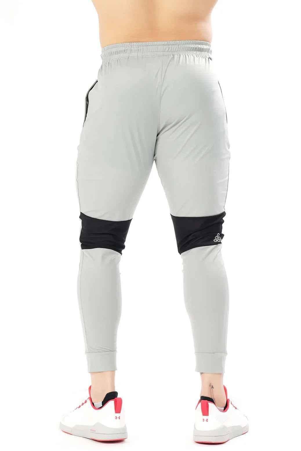 Light grey nylon joggers by Fuaark Nz featuring a comfortable, stylish fit with a modern design.