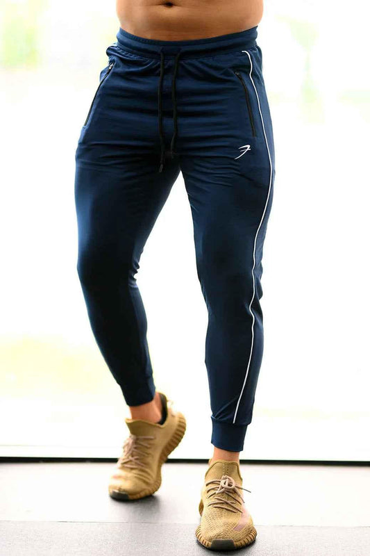 Fuaark Nz men's blue Revival Joggers, stylish and comfortable activewear joggers with a relaxed fit and modern design.