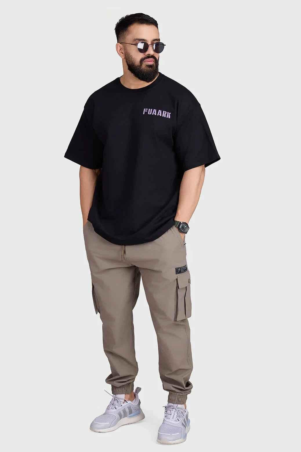 Brown Fuaark Nz Script Cargo Joggers featuring a relaxed fit, multiple pockets, and casual style for comfortable everyday wear.
