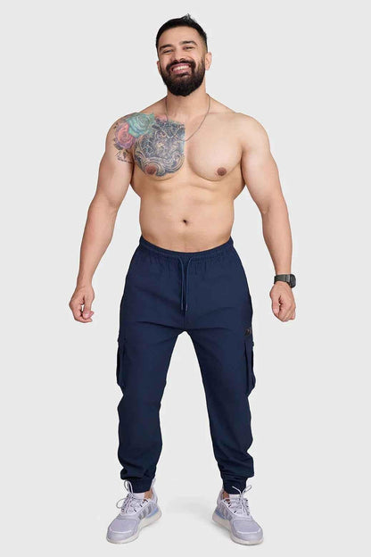 Dark navy Script Cargo Joggers by Fuaark Nz featuring a relaxed fit, multiple cargo pockets, and comfortable jogger style.