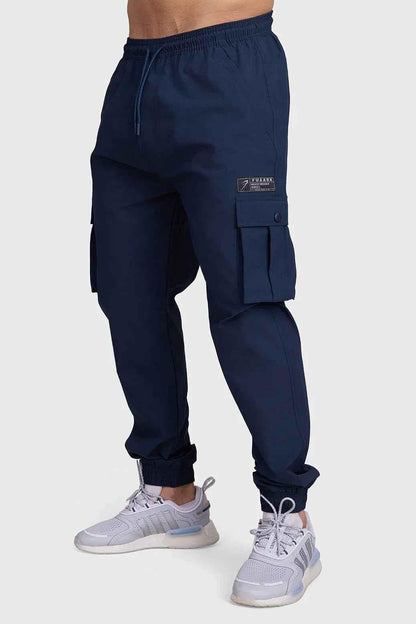 Dark navy Script Cargo Joggers by Fuaark Nz, featuring relaxed fit and multiple cargo pockets, casual and comfortable.