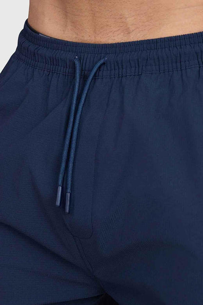 Dark navy Script Cargo Joggers by Fuaark Nz, featuring relaxed fit and multiple cargo pockets, casual streetwear style.