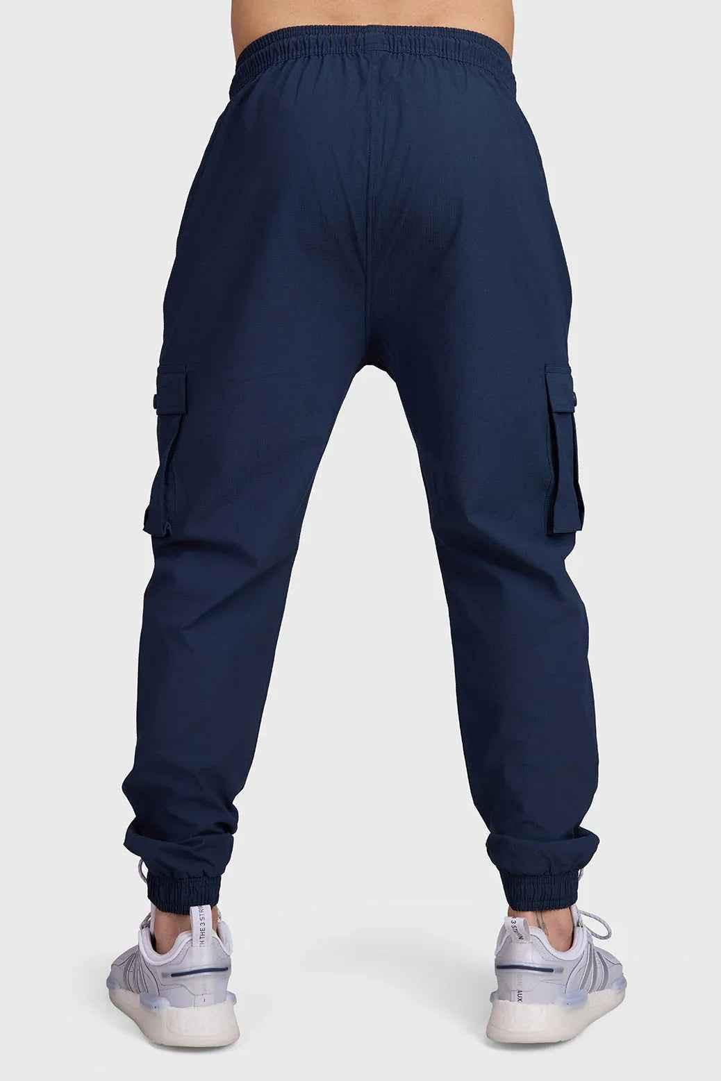 Dark navy Fuaark Nz Script Cargo Joggers featuring multiple pockets and a relaxed fit for casual comfort.