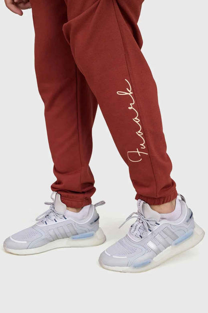 Rust-colored Fuaark Nz Signature Oversized Band Joggers, soft and stylish casual joggers with a relaxed fit and bold band detail.