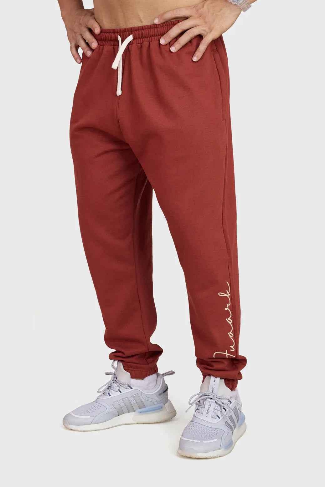Rust-colored Fuaark Nz Signature Oversized Band Joggers, comfortable casual joggers with a relaxed fit and bold band detail.