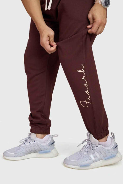 Fuaark Nz Signature oversized brown joggers with a relaxed fit and comfortable waistband, shown on a model.