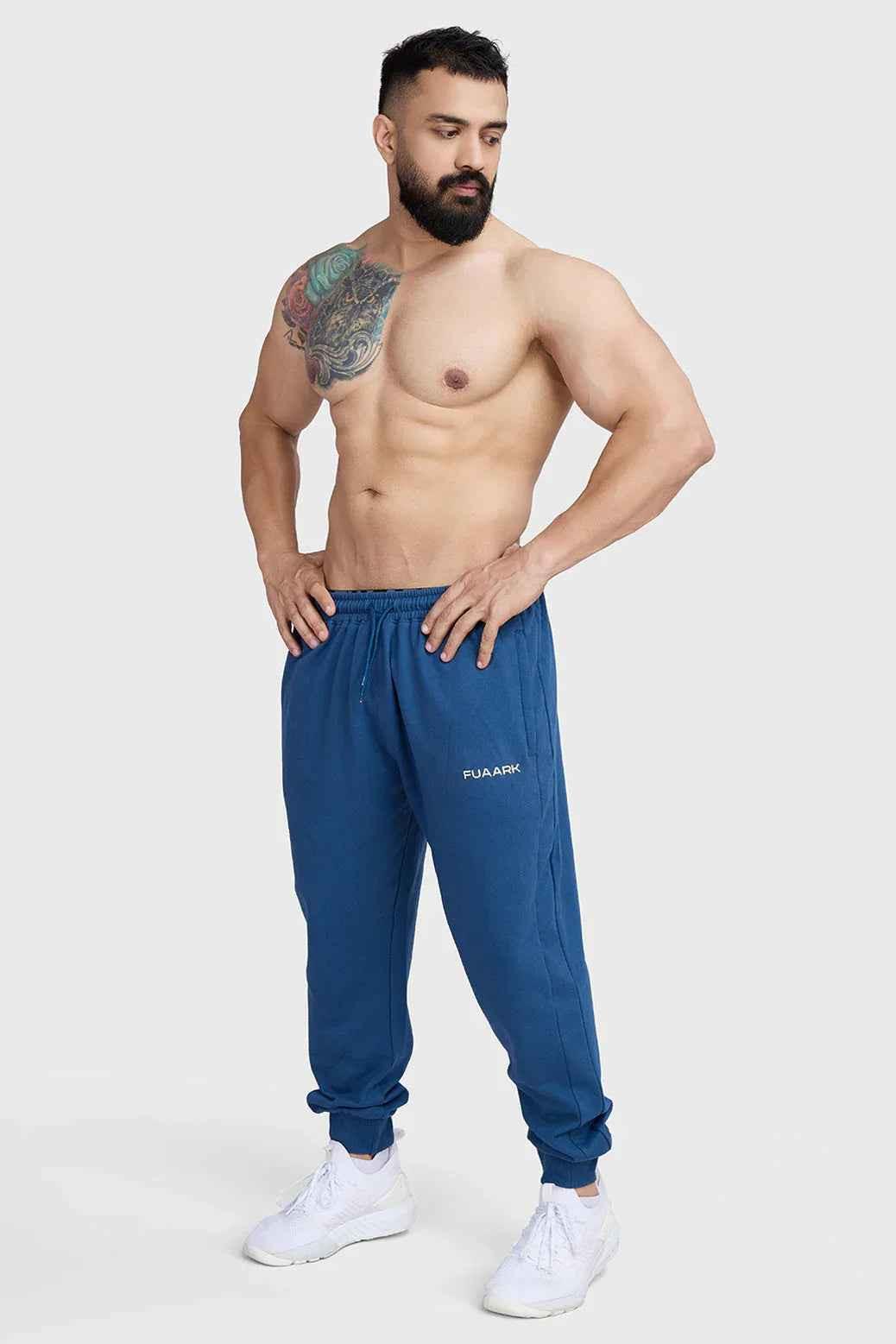 Navy Fuaark Nz Signature Oversized Joggers laid flat, showcasing relaxed fit and soft fabric for casual wear.