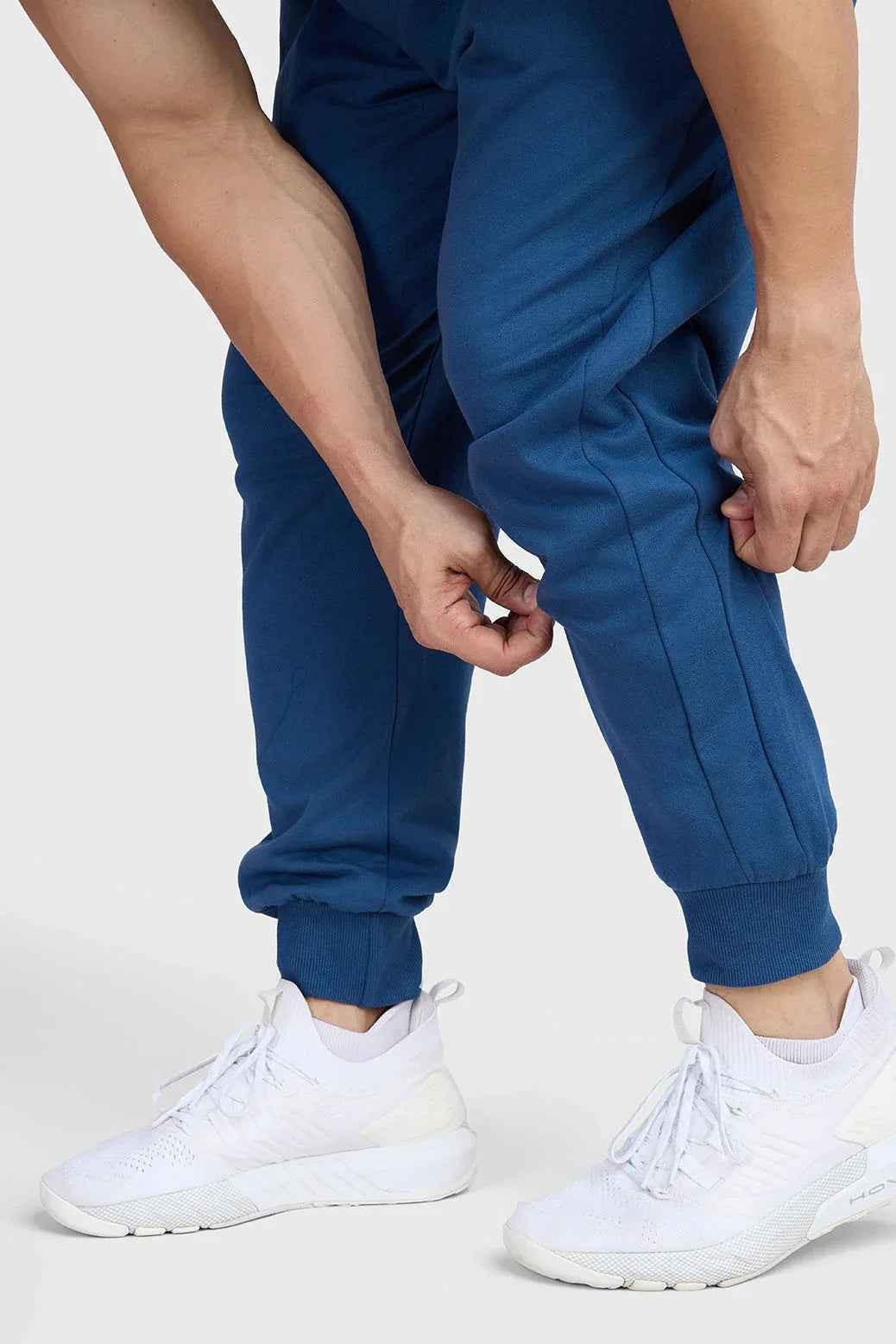 Fuaark Nz Signature Oversized Navy Joggers, soft fabric, relaxed fit, waistband with drawstrings, front pockets, casual style.