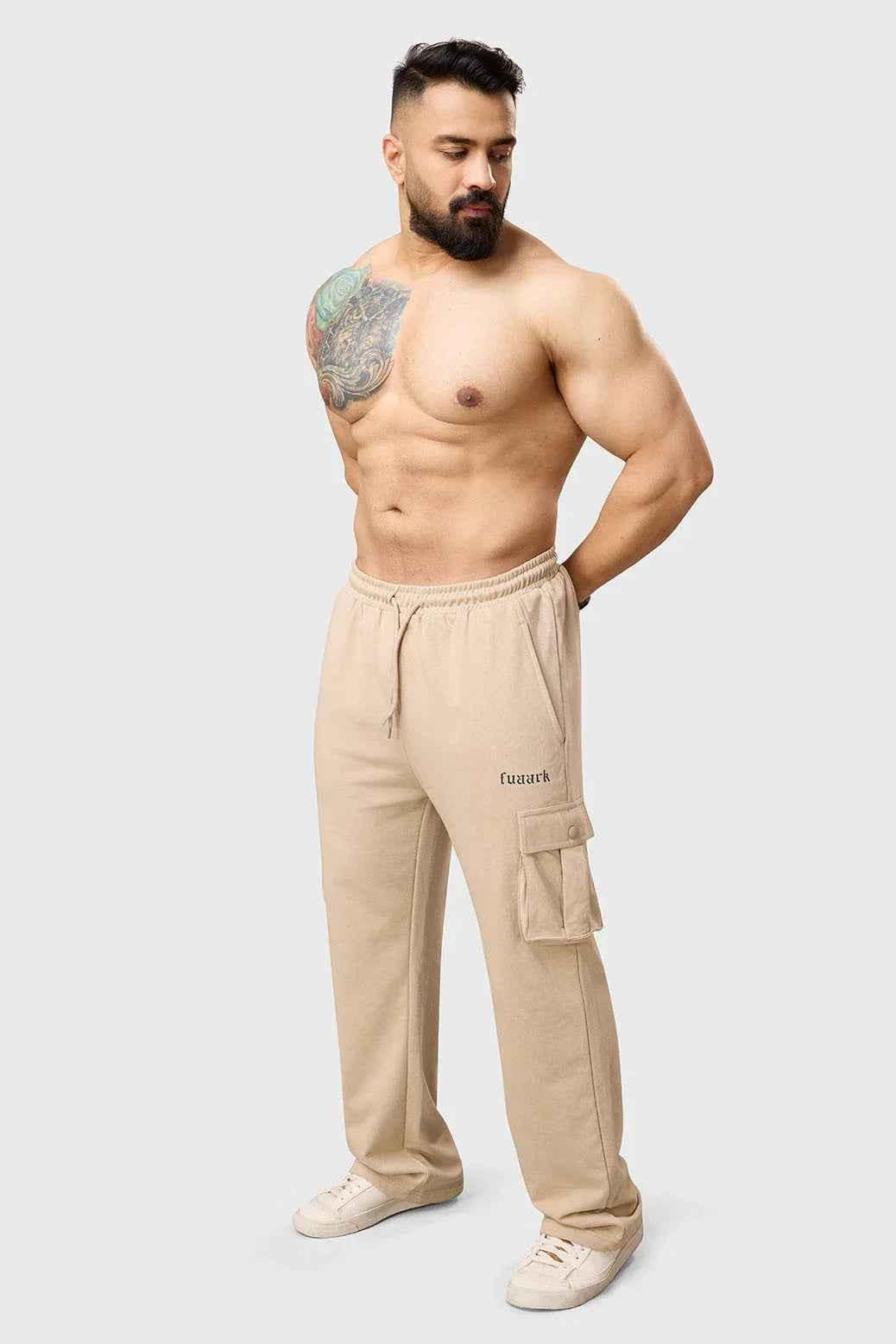 Beige Fuaark Nz Pinnacle Pocket Pants joggers with side pockets, slim fit design, made from soft, comfortable fabric.