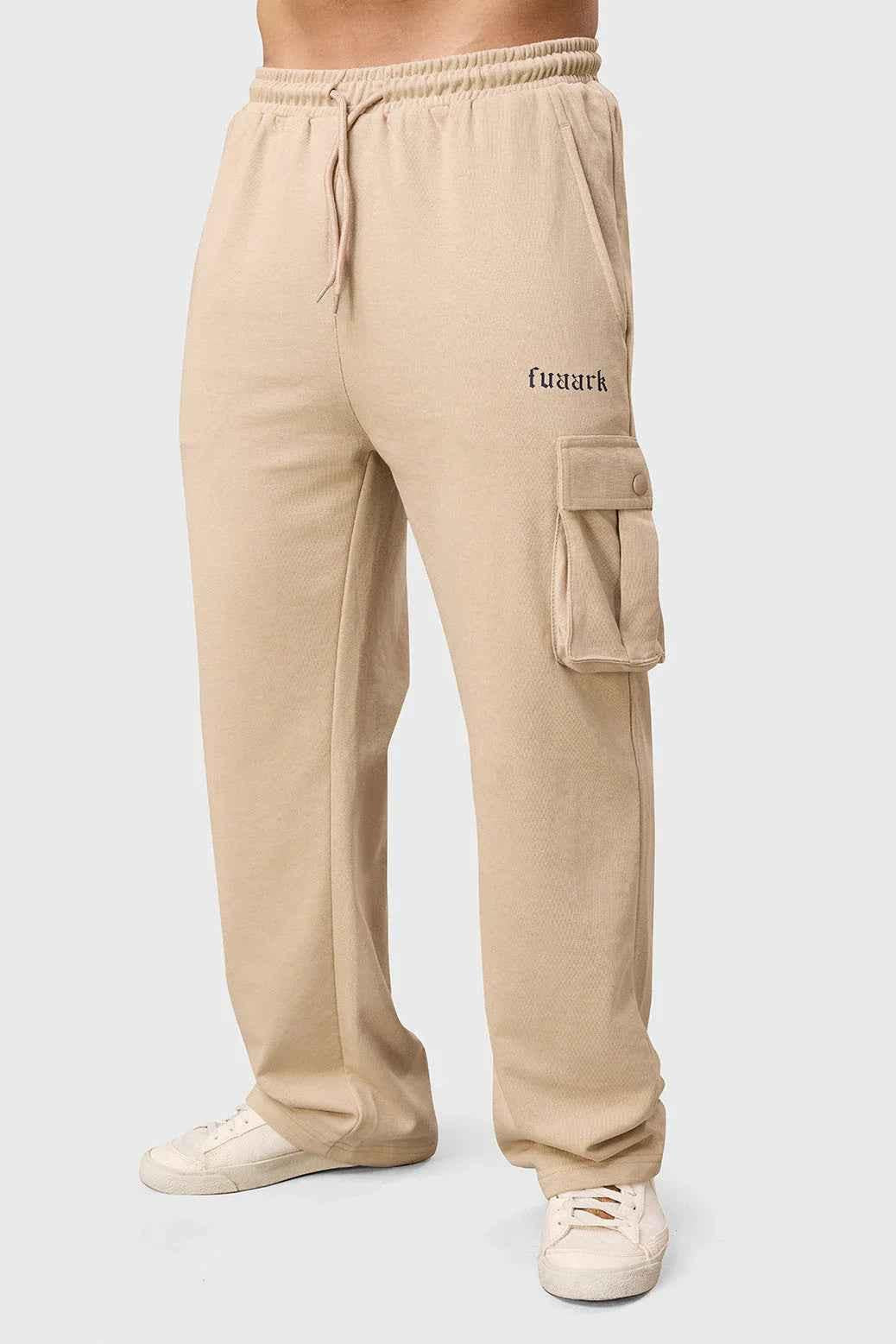 Fuaark NZ Pinnacle Pocket Pants beige joggers with side pockets, slim fit, and comfortable fabric for casual wear.