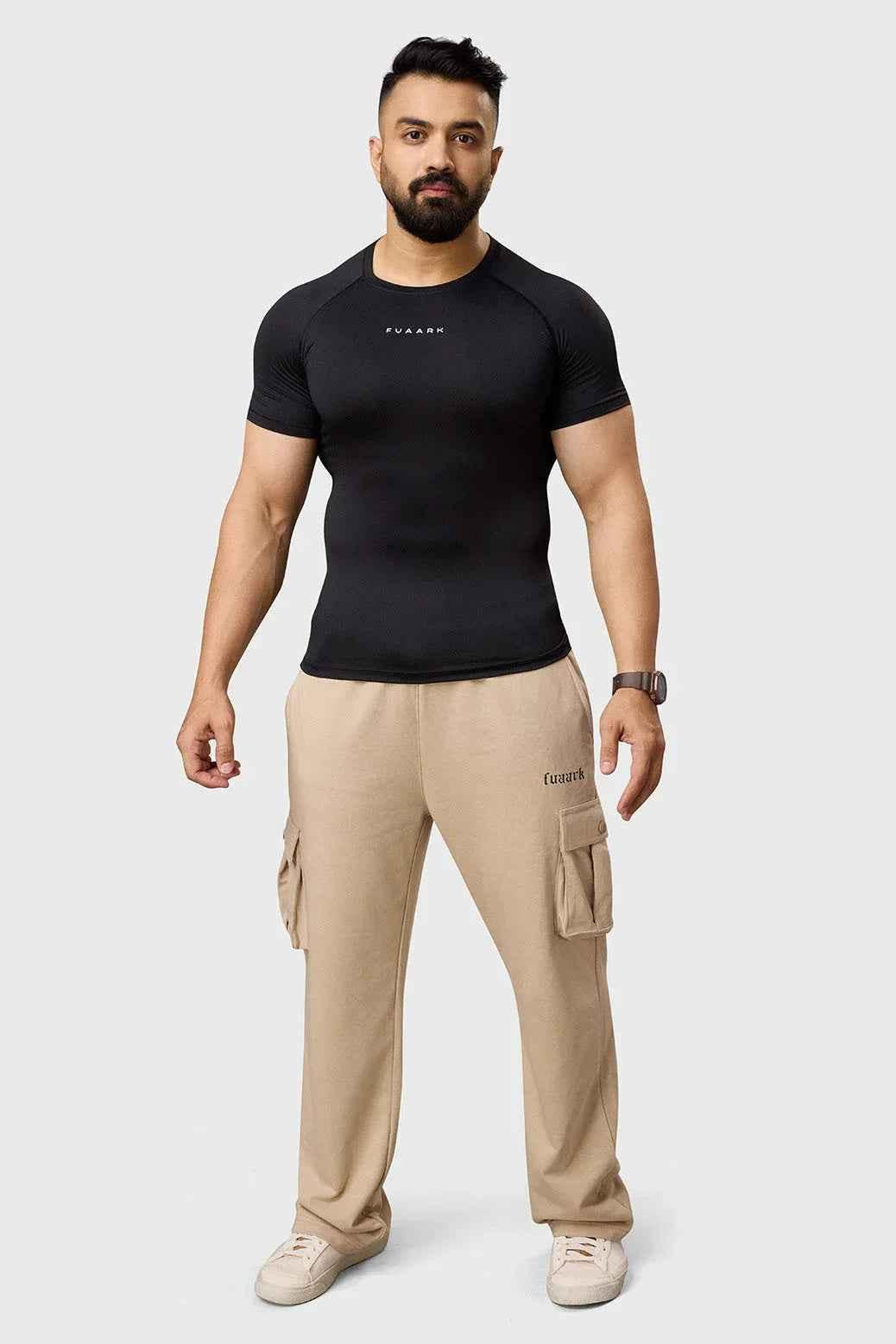 Beige Fuaark Nz Pinnacle Pocket Pants joggers with side pockets, slim fit design, made from comfortable fabric.