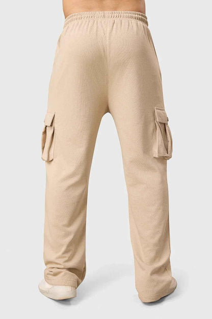 Beige Fuaark NZ Pinnacle Pocket Joggers with side pockets, slim fit, and comfortable fabric, perfect for casual wear.