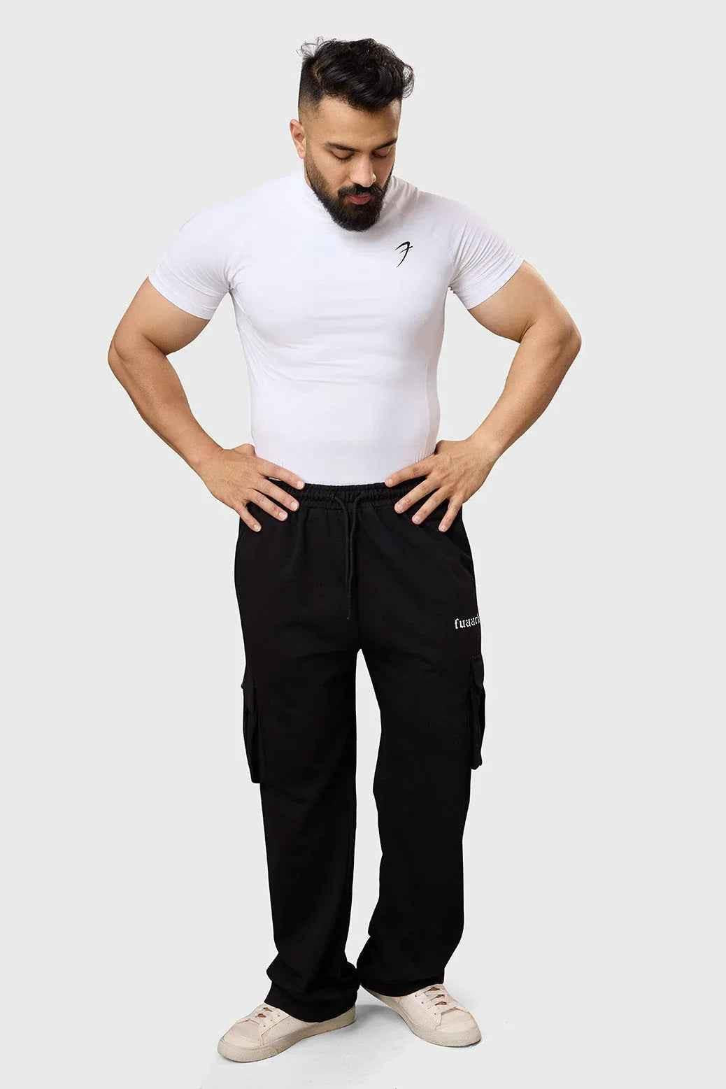 Fuaark Nz Pinnacle Pocket Pants in black, casual joggers with side pockets, tailored for comfort and style.
