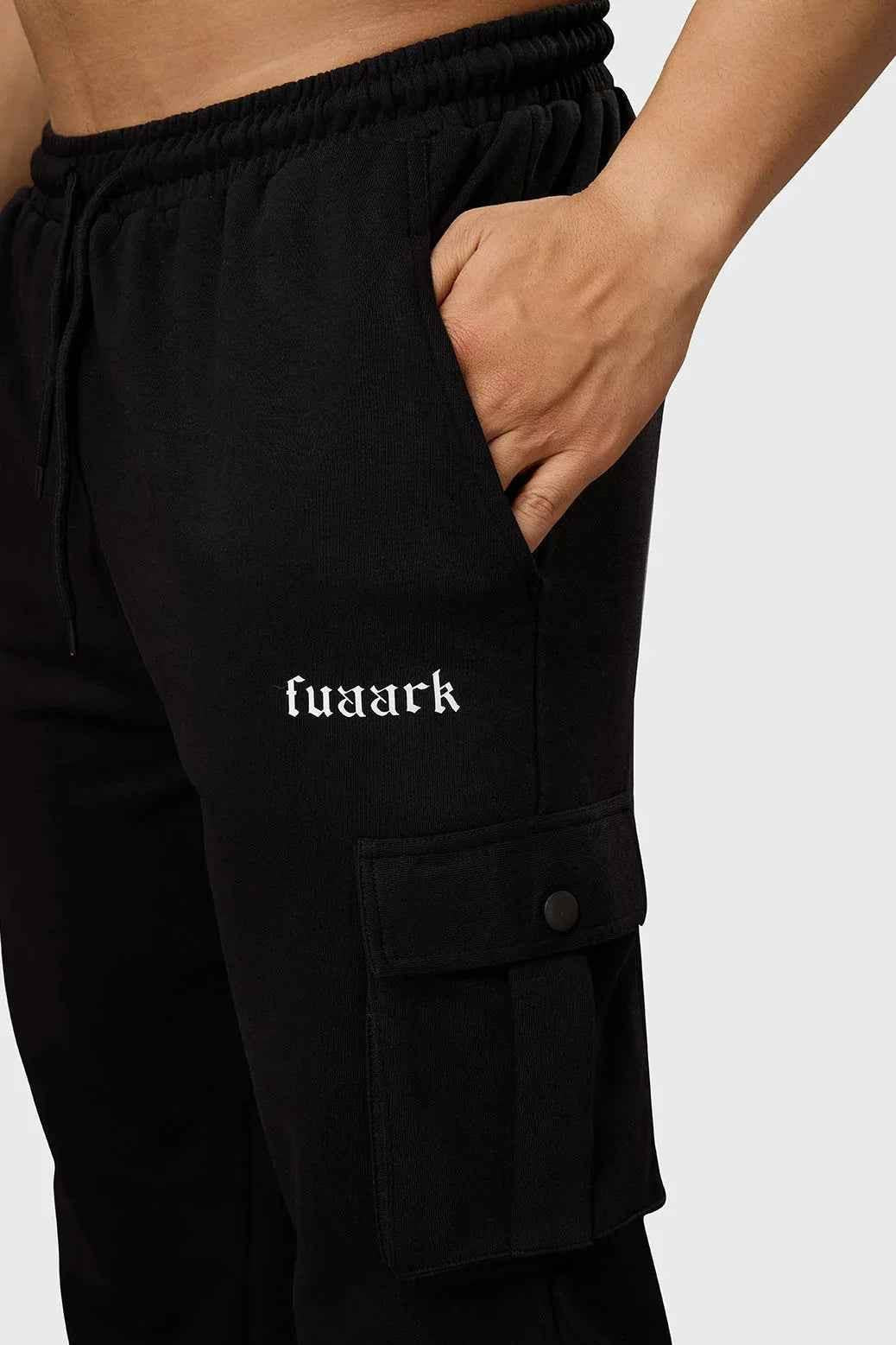 Black Pinnacle Pocket Pants joggers by Fuaark Nz, featuring a comfortable fit and functional pockets, shown in XS size.