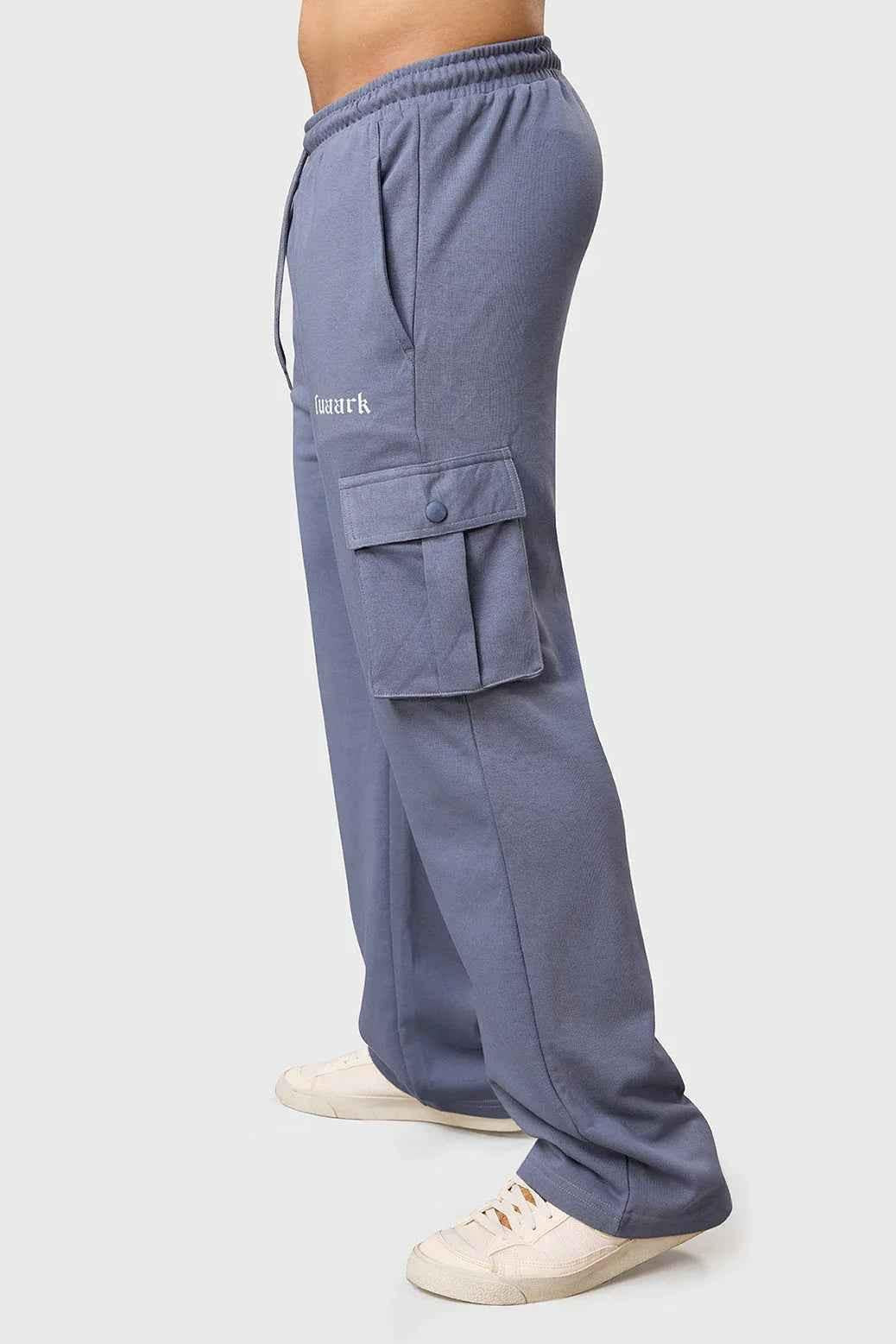 Grey Fuaark Nz Pinnacle Pocket Pants joggers with side pockets, slim fit design, shown in a close-up image.