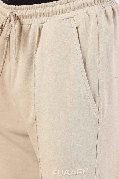 Beige Pinnacle Straight Pants joggers by Fuaark Nz, showing the fit and fabric detail of the casual straight-leg style.