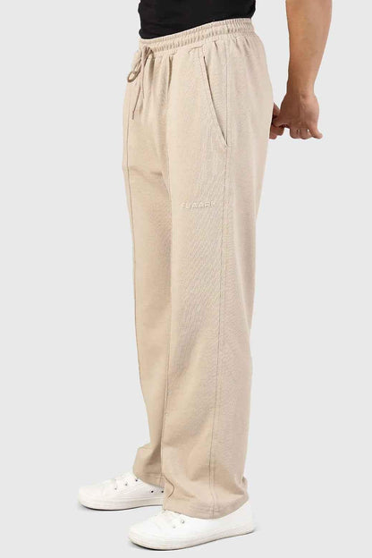 Fuaark Nz beige Pinnacle Straight Joggers pants, slim fit with elastic waistband and casual style, front view.