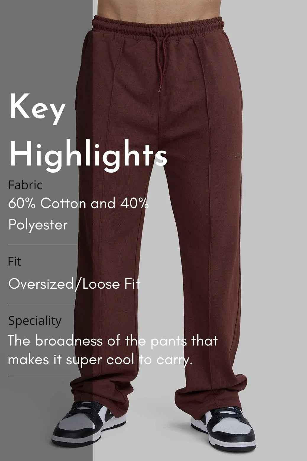 Fuaark Nz Pinnacle Straight Pants brown joggers made of soft fabric, shown folded with waistband and tapered legs visible.
