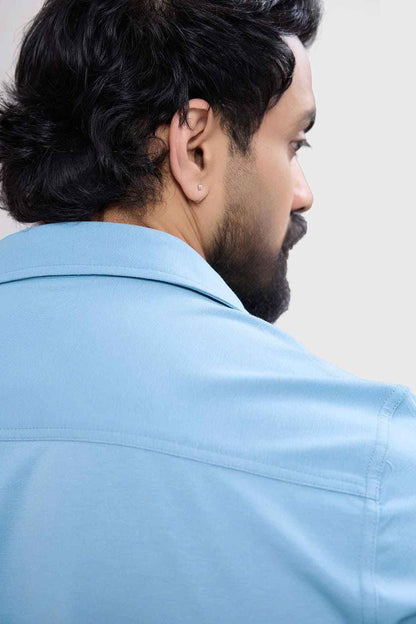 Men's Aero Shirt by Fuaark Nz in stone blue fabric, featuring a casual fit and classic collar style.
