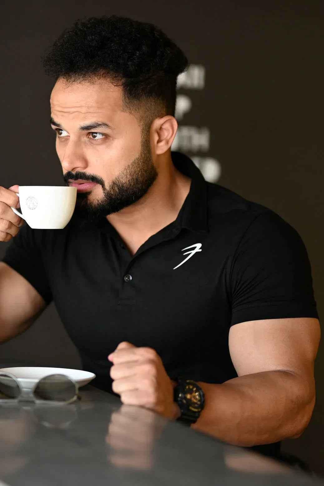 Black Polo T-Shirt by Fuaark Nz featuring a classic polo collar and comfortable fit, perfect for timeless style and casual wear.