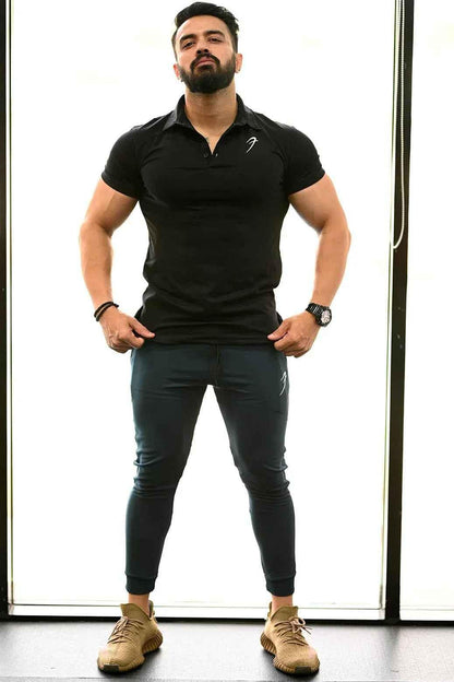Black polo T-shirt for men by Fuaark Nz, showcasing a classic polo design with a comfortable fit and timeless style.