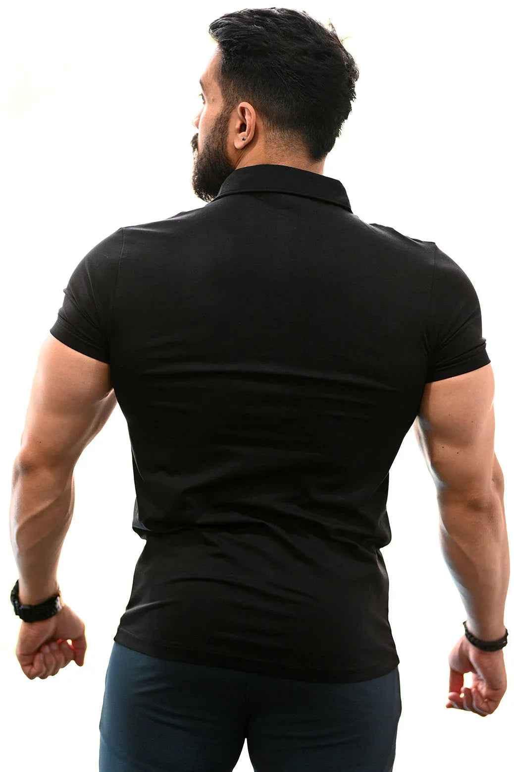 Black polo T-shirt by Fuaark Nz featuring classic style and comfortable fit, perfect for casual or smart-casual wear.