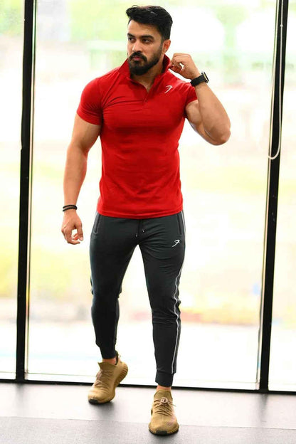 Maroon Polo T-shirt by Fuaark Nz, featuring a classic polo collar and short sleeves, displayed on a neutral background.