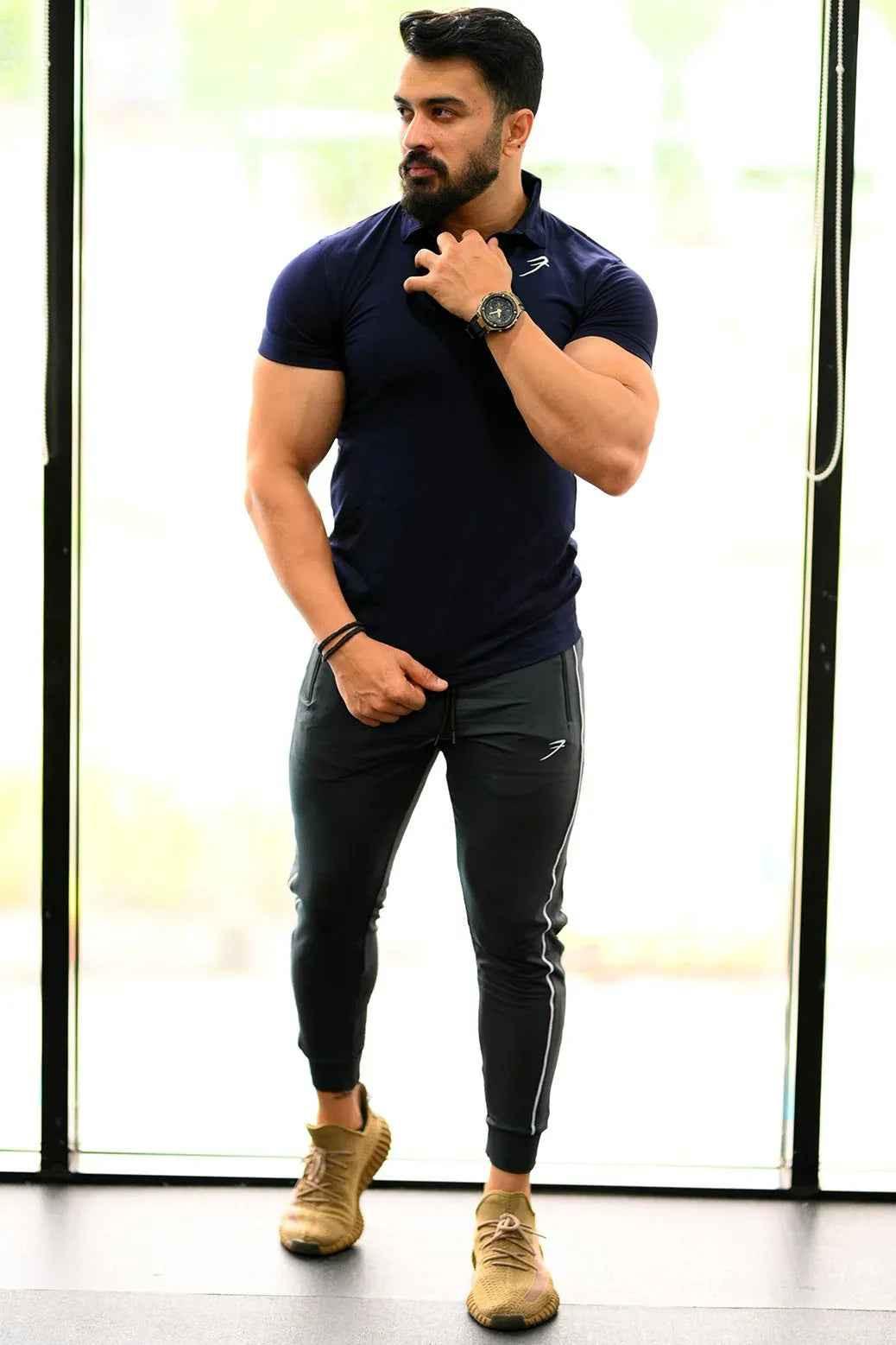 Navy Polo T-shirt by Fuaark Nz, featuring classic polo collar and short sleeves, perfect for casual wear.