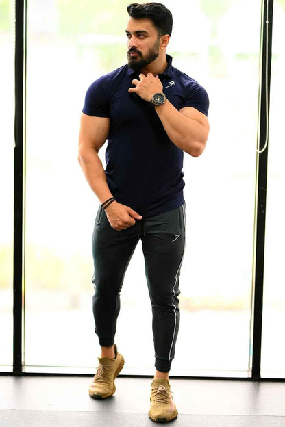 Navy Polo T-shirt by Fuaark Nz, featuring classic polo collar and short sleeves, perfect for casual wear.