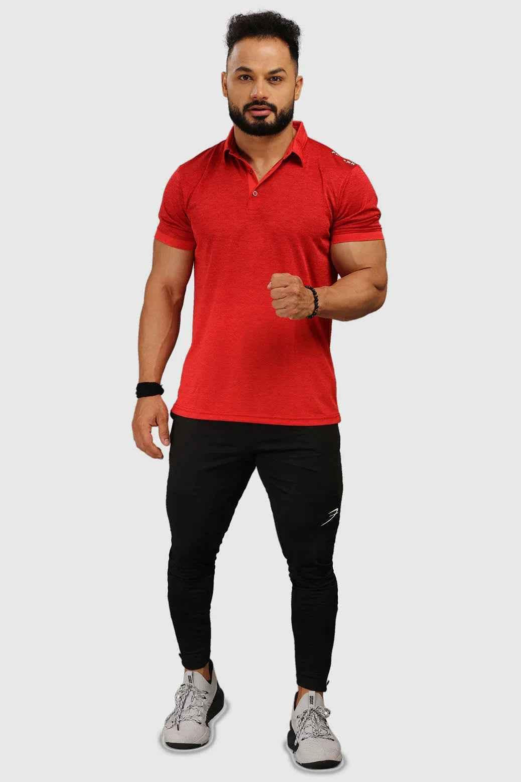 Red Raw Polo Regular Fit T-shirt by Fuaark Nz, showcasing a classic polo design with a comfortable fit and short sleeves.