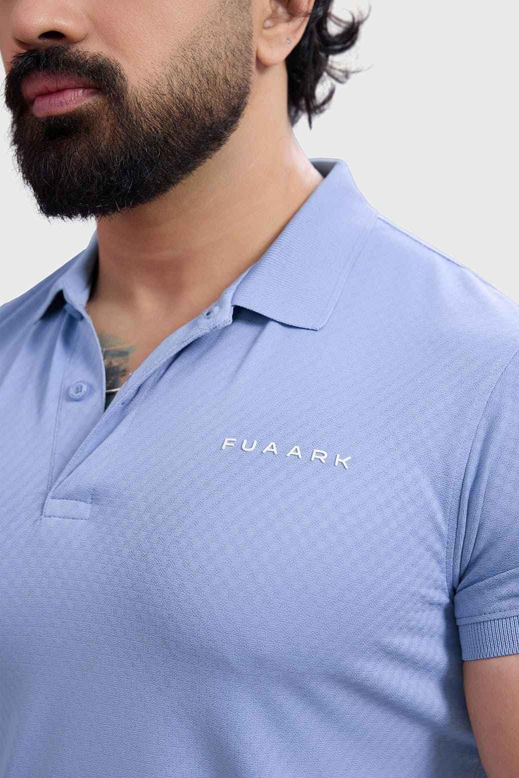 Light blue Wave Polo T-shirt by Fuaark Nz, featuring a classic polo collar and short sleeves, displayed flat.