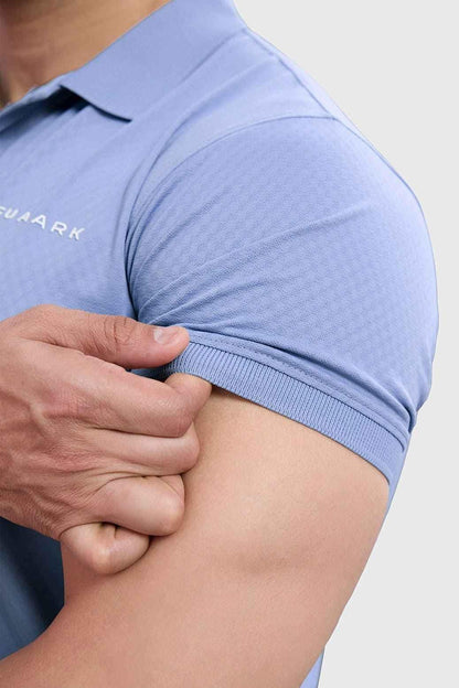 Light blue Wave Polo T-shirt by Fuaark Nz, featuring a classic polo collar and short sleeves, made from soft cotton fabric.