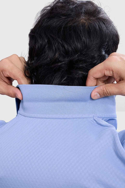 Light blue Wave Polo T-shirt by Fuaark Nz, featuring a classic polo collar and comfortable fit, designed for casual style.