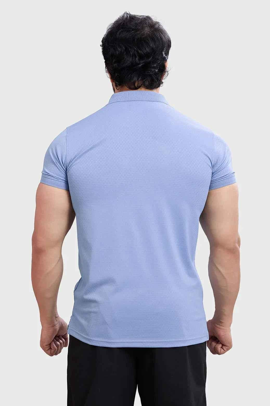 Light blue Wave Polo T-shirt by Fuaark Nz featuring a classic polo collar and subtle wave design.
