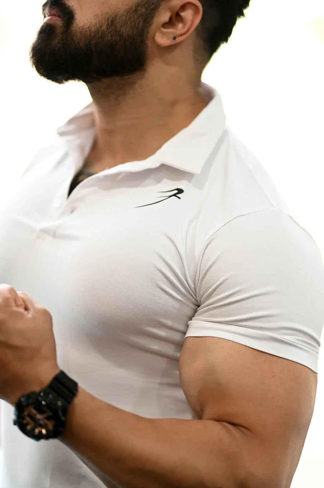 White Fuaark Nz polo shirt for men, featuring a classic fit and soft cotton fabric for effortless style and comfort.