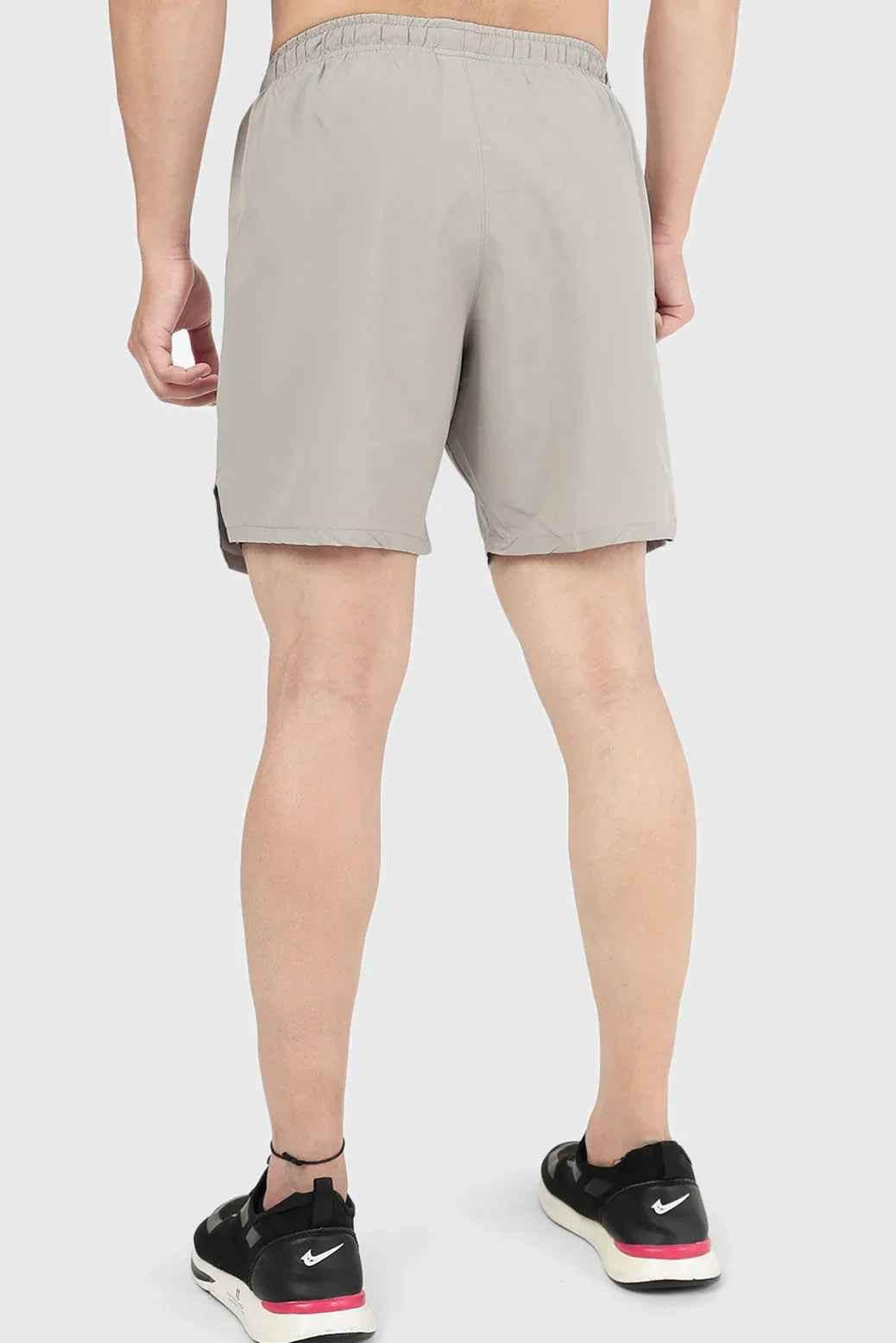 Fuaark NZ 2-in-1 beige compression shorts with supportive fit and stretchy fabric for active wear and athletic performance.