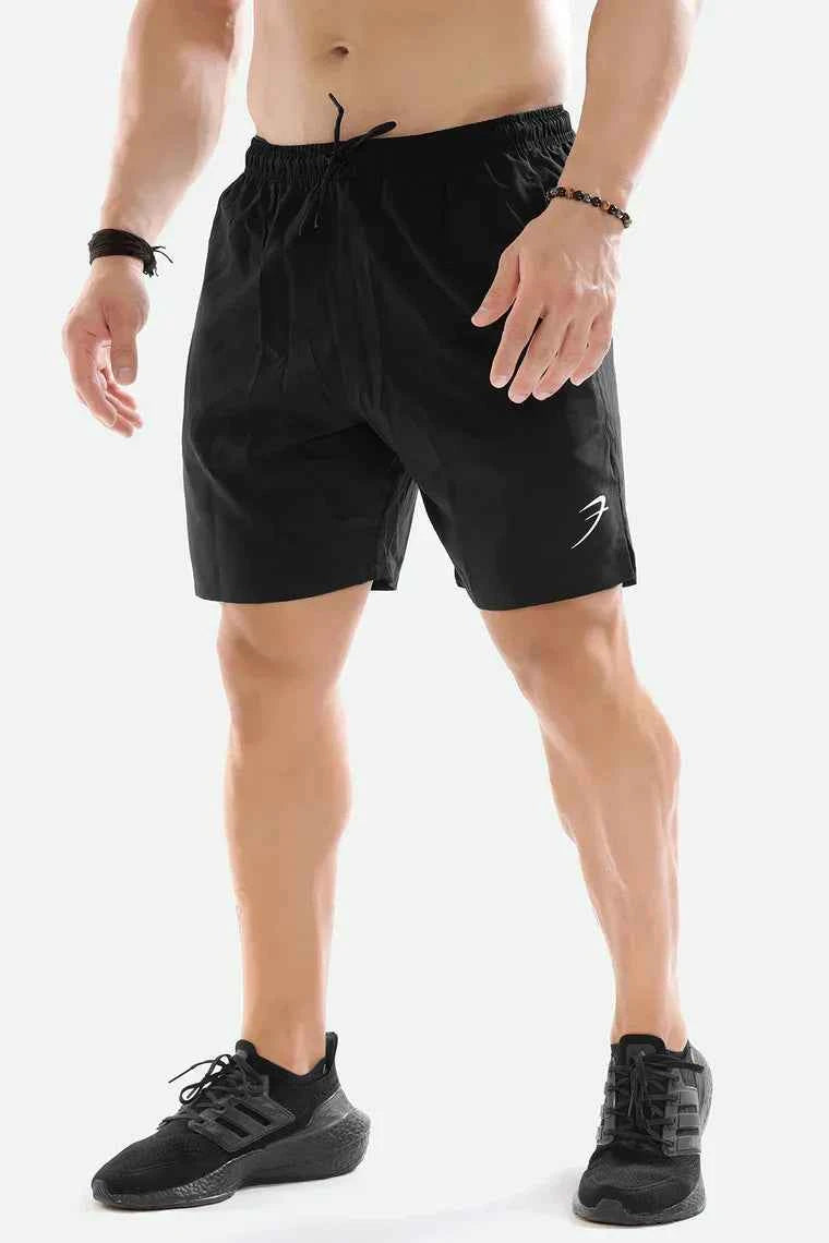 Black 2-in-1 compression shorts by Fuaark NZ, designed for athletic performance and comfort during workouts.