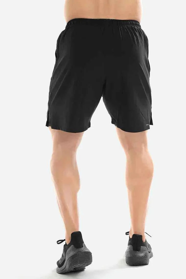 Black Fuaark Nz 2-in-1 compression shorts for men, showing a snug fit and elastic waistband, ideal for athletic activities.