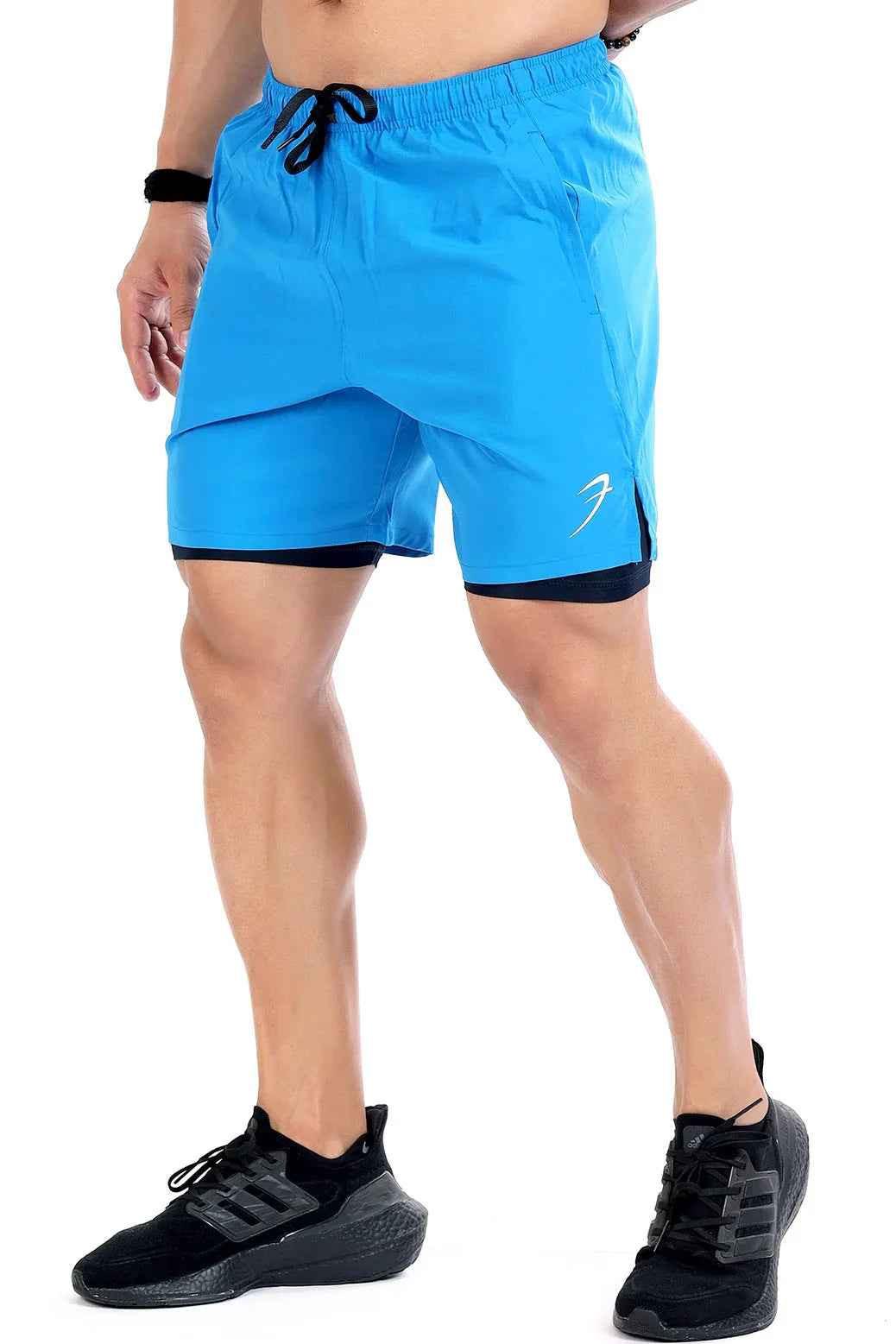 Blue 2-in-1 compression shorts by Fuaark Nz, designed for athletic performance and comfortable fit.