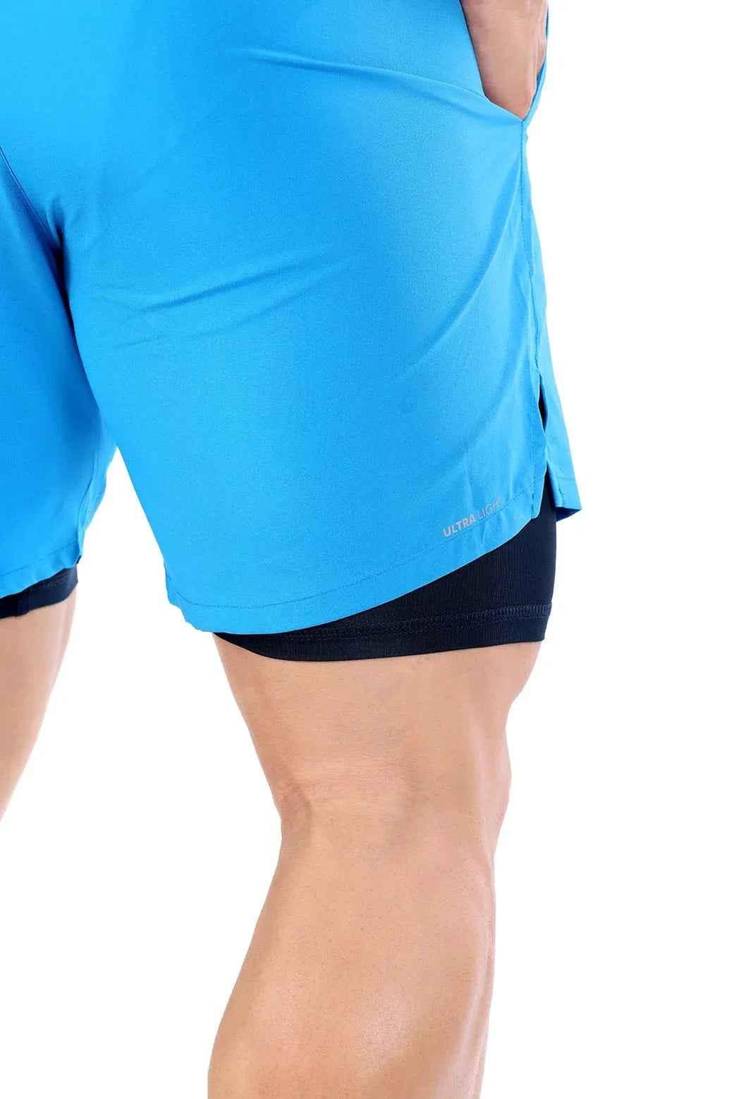 Blue 2-in-1 compression shorts by Fuaark NZ with breathable fabric and elastic waistband, designed for active wear and support.