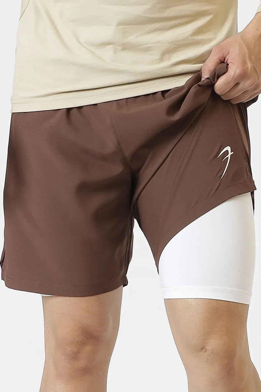 Brown 2-in-1 compression shorts by Fuaark Nz featuring a snug fit and elastic waistband for active wear and comfort.