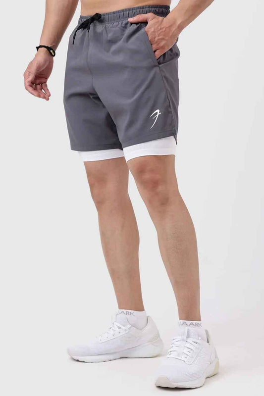 Fuaark Nz 2-in-1 compression shorts in grey with white accents, featuring a snug fit for active wear and athletic support.