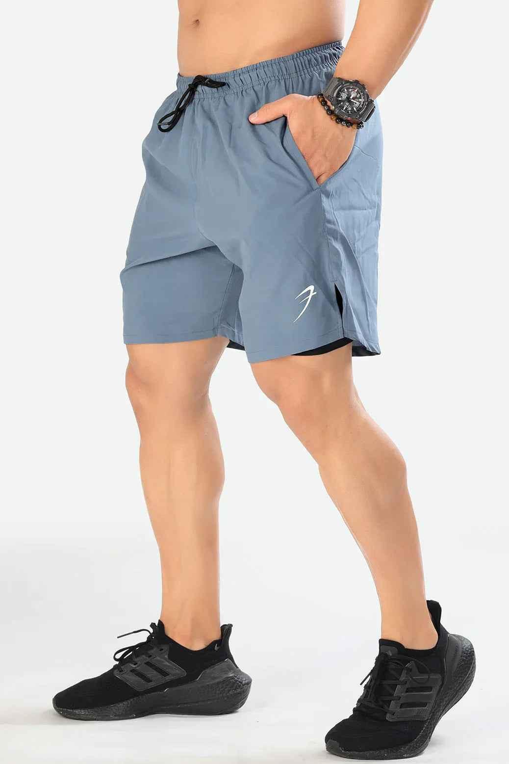 Light grey 2-in-1 compression shorts by Fuaark Nz, designed for athletic performance and comfort.